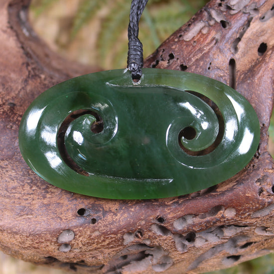 Koru pendant carved from Kawakawa Pounamu - NZ Greenstone