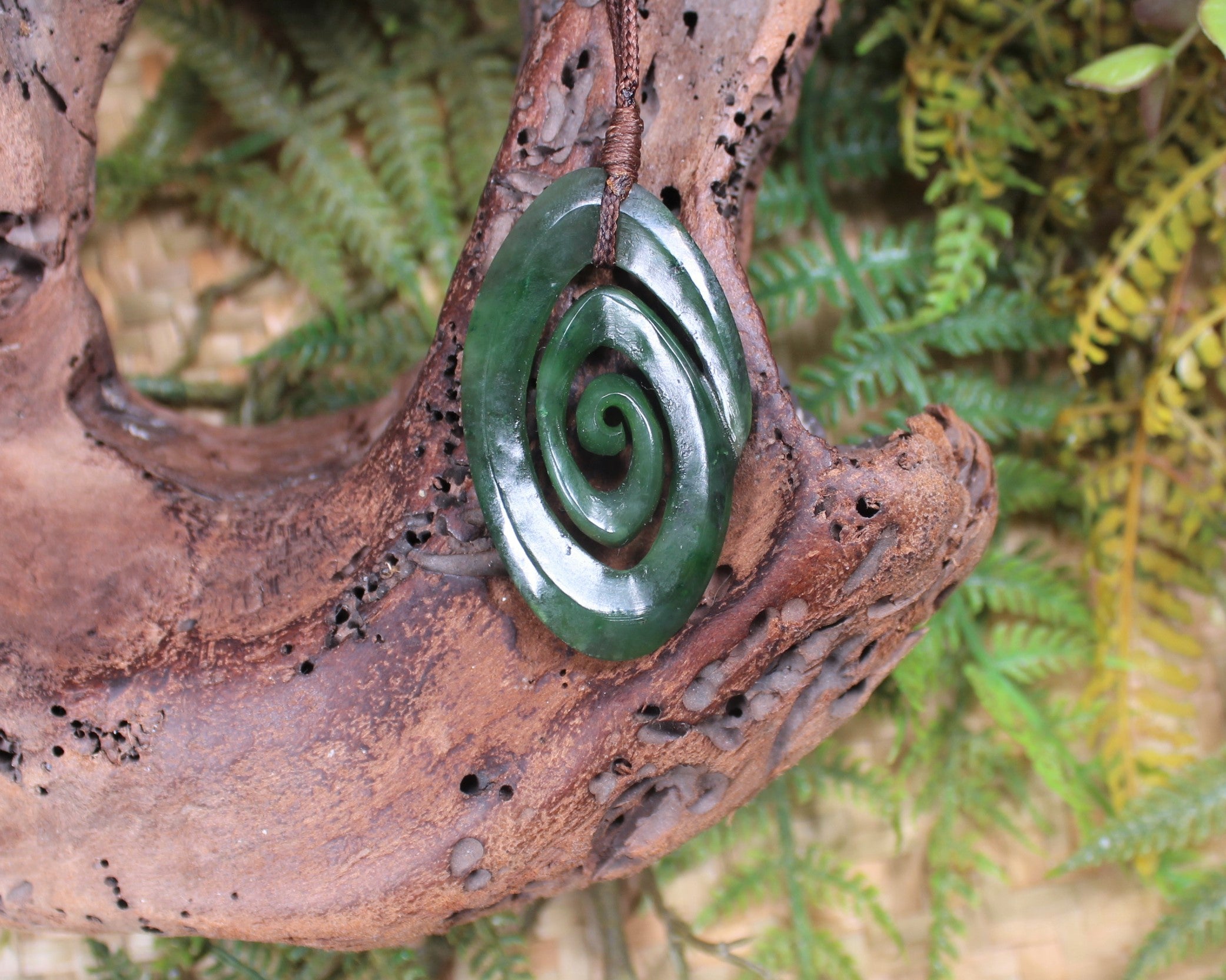 Koru pendant carved from Kawakawa Pounamu - NZ Greenstone