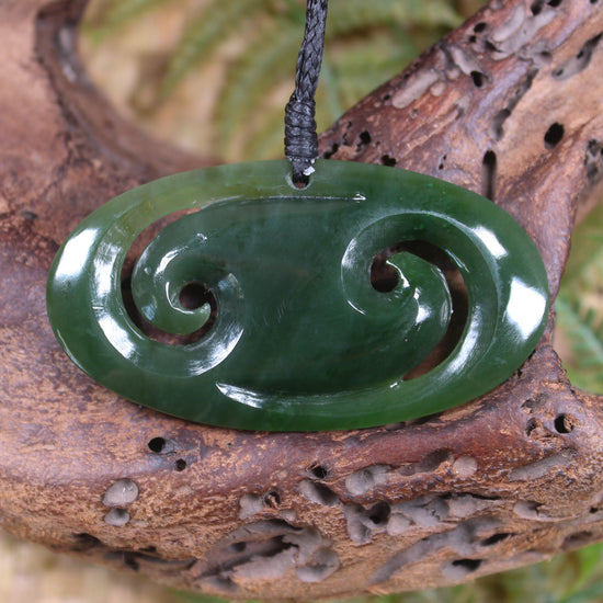 Koru pendant carved from Kawakawa Pounamu - NZ Greenstone