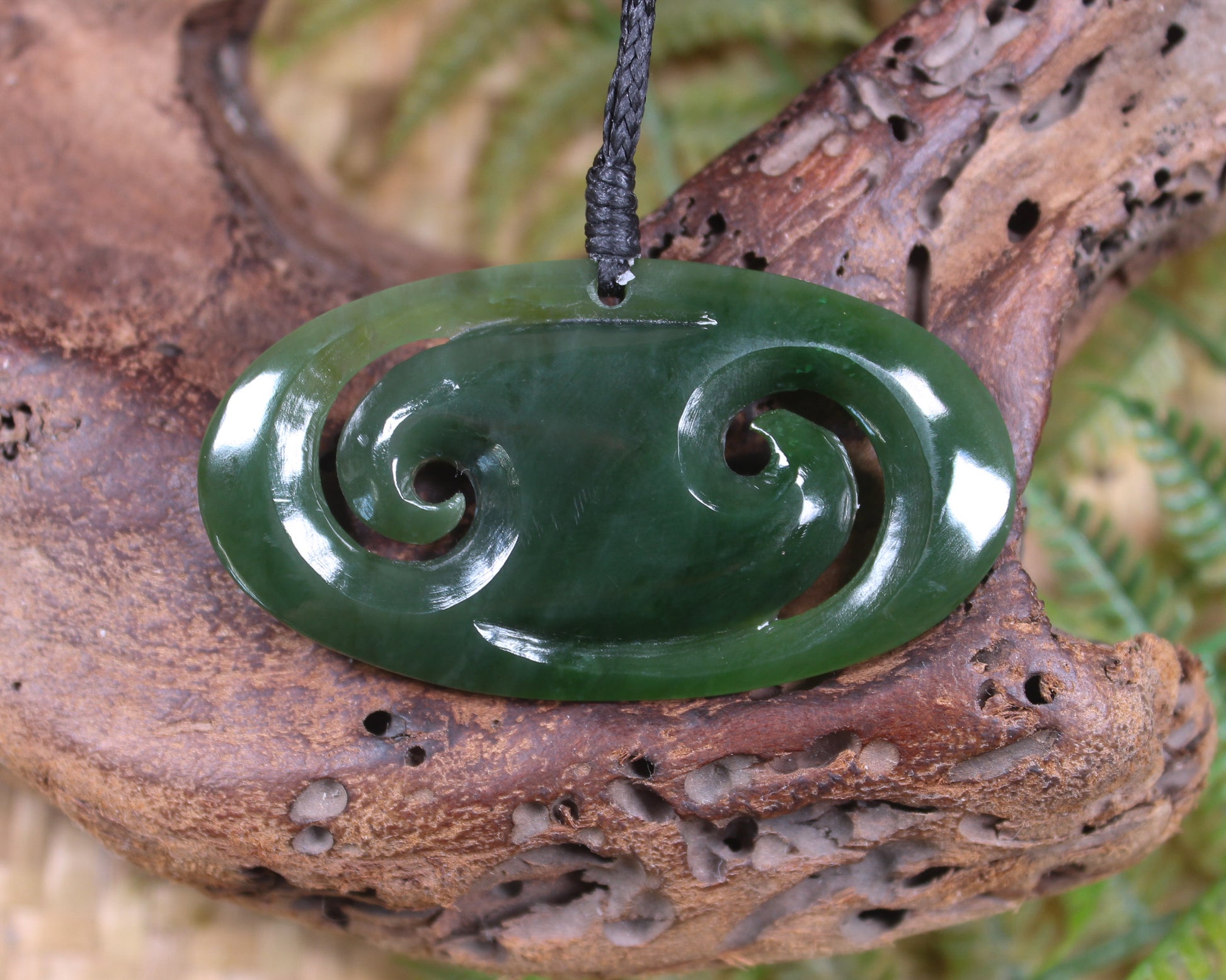 Koru pendant carved from Kawakawa Pounamu - NZ Greenstone