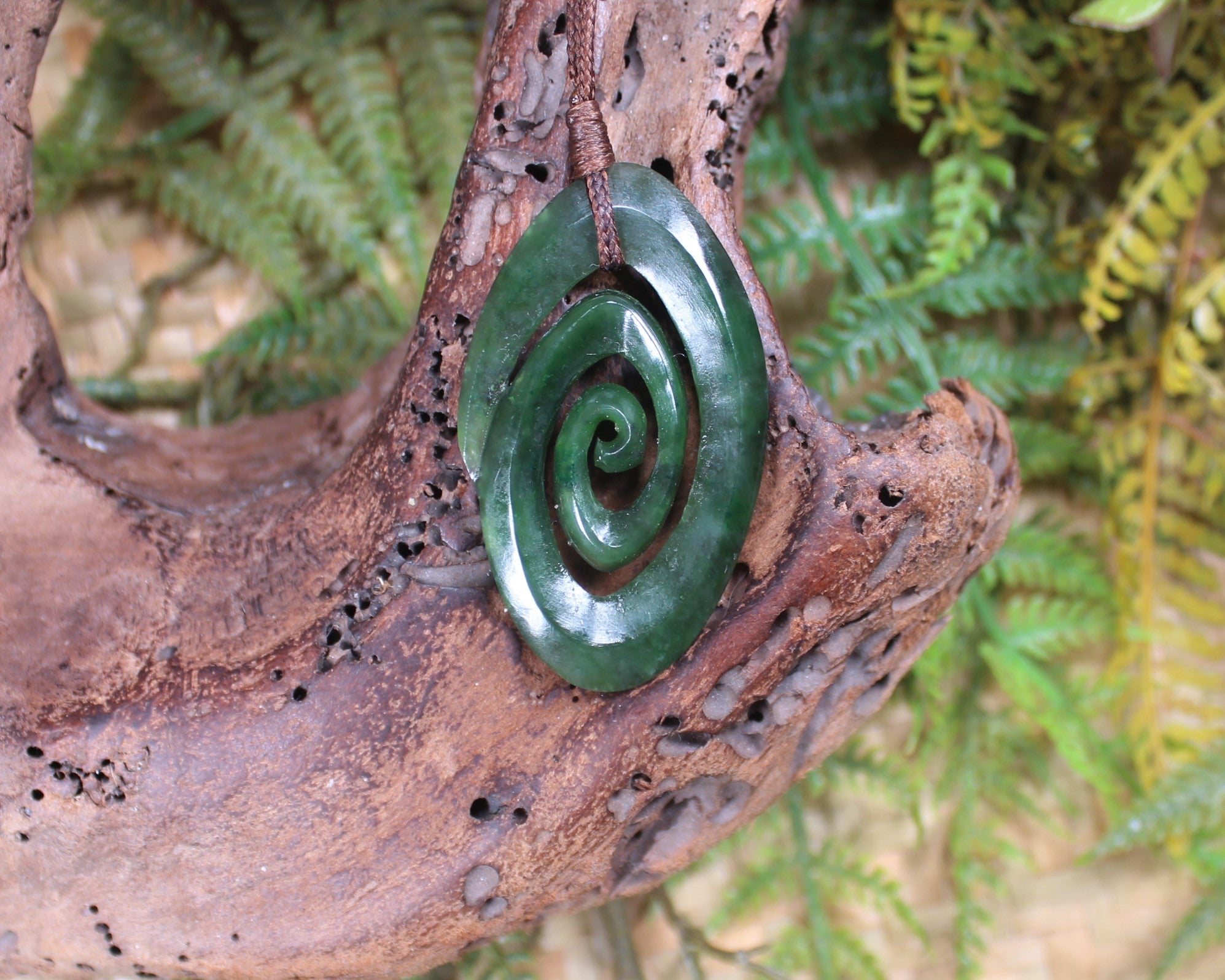Koru pendant carved from Kawakawa Pounamu - NZ Greenstone