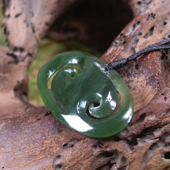 Koru pendant carved from Kawakawa Pounamu - NZ Greenstone