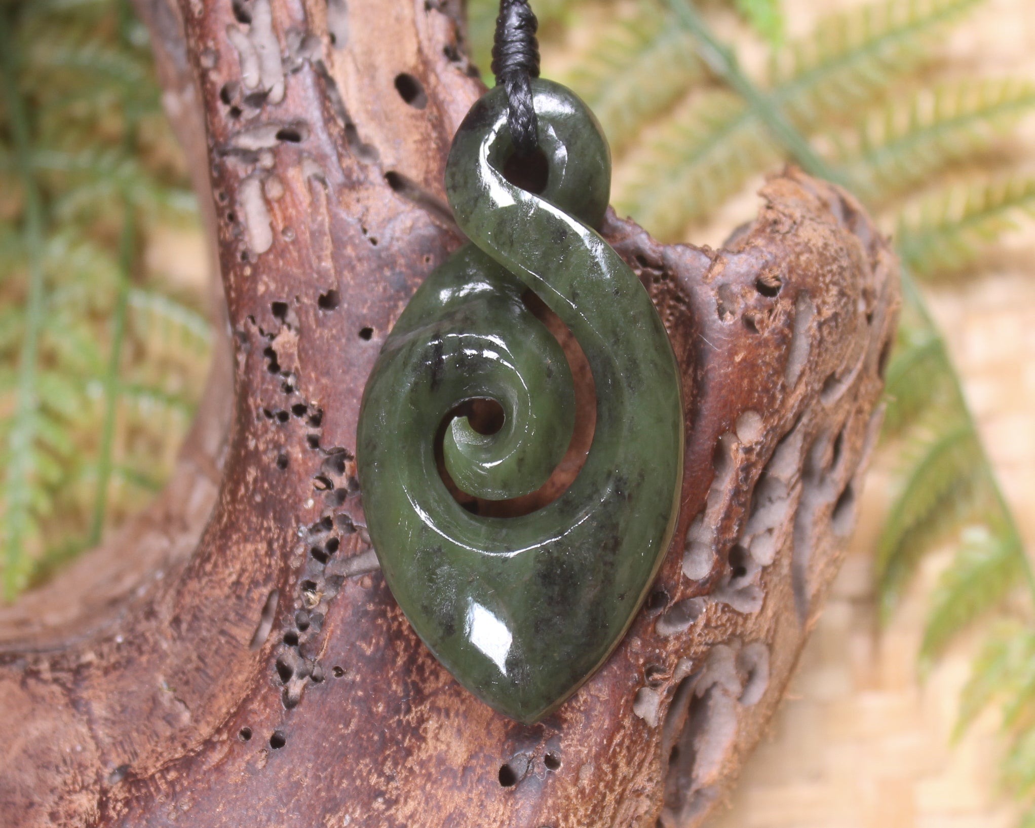 Koru Twist carved from Rimu Pounamu - NZ Greenstone