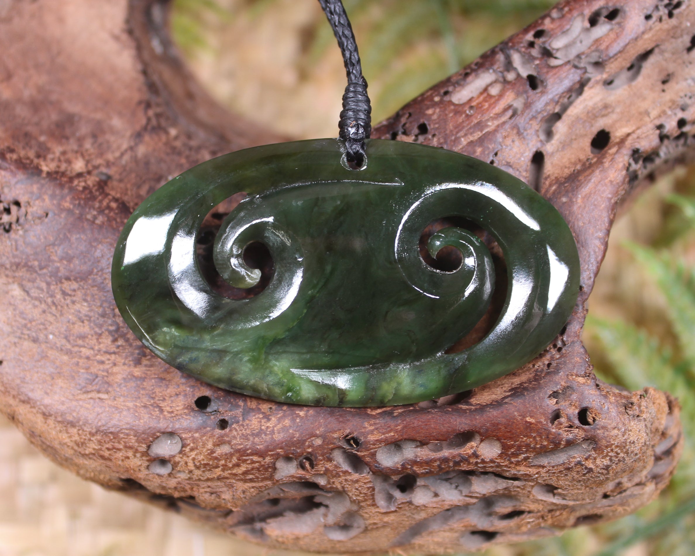 Koru carved from Rimu Pounamu - NZ Greenstone