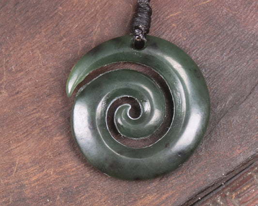 Koru pendant carved from Kawakawa Pounamu - NZ Greenstone