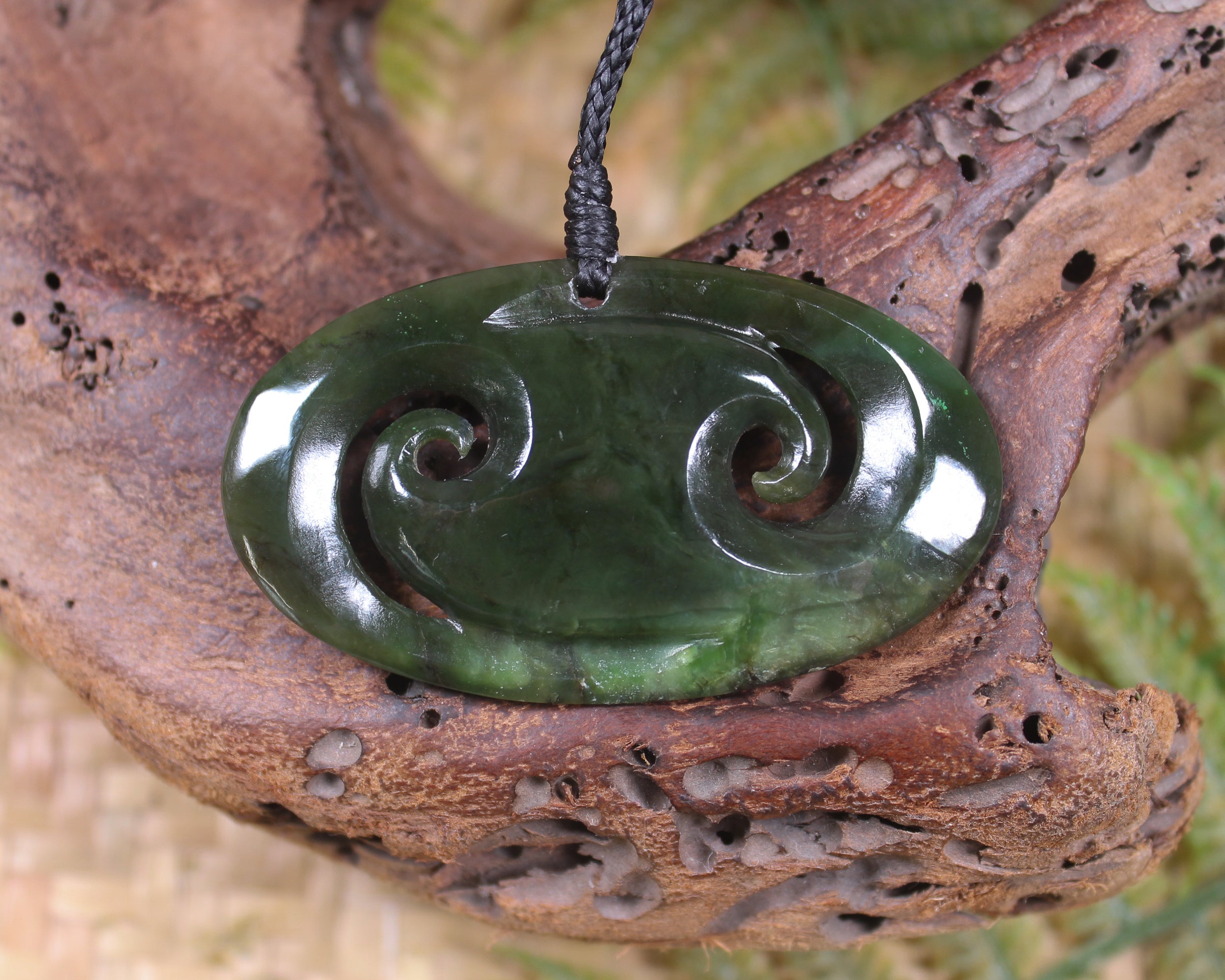 Koru carved from Rimu Pounamu - NZ Greenstone