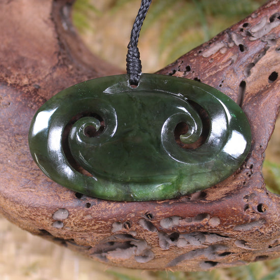 Koru carved from Rimu Pounamu - NZ Greenstone