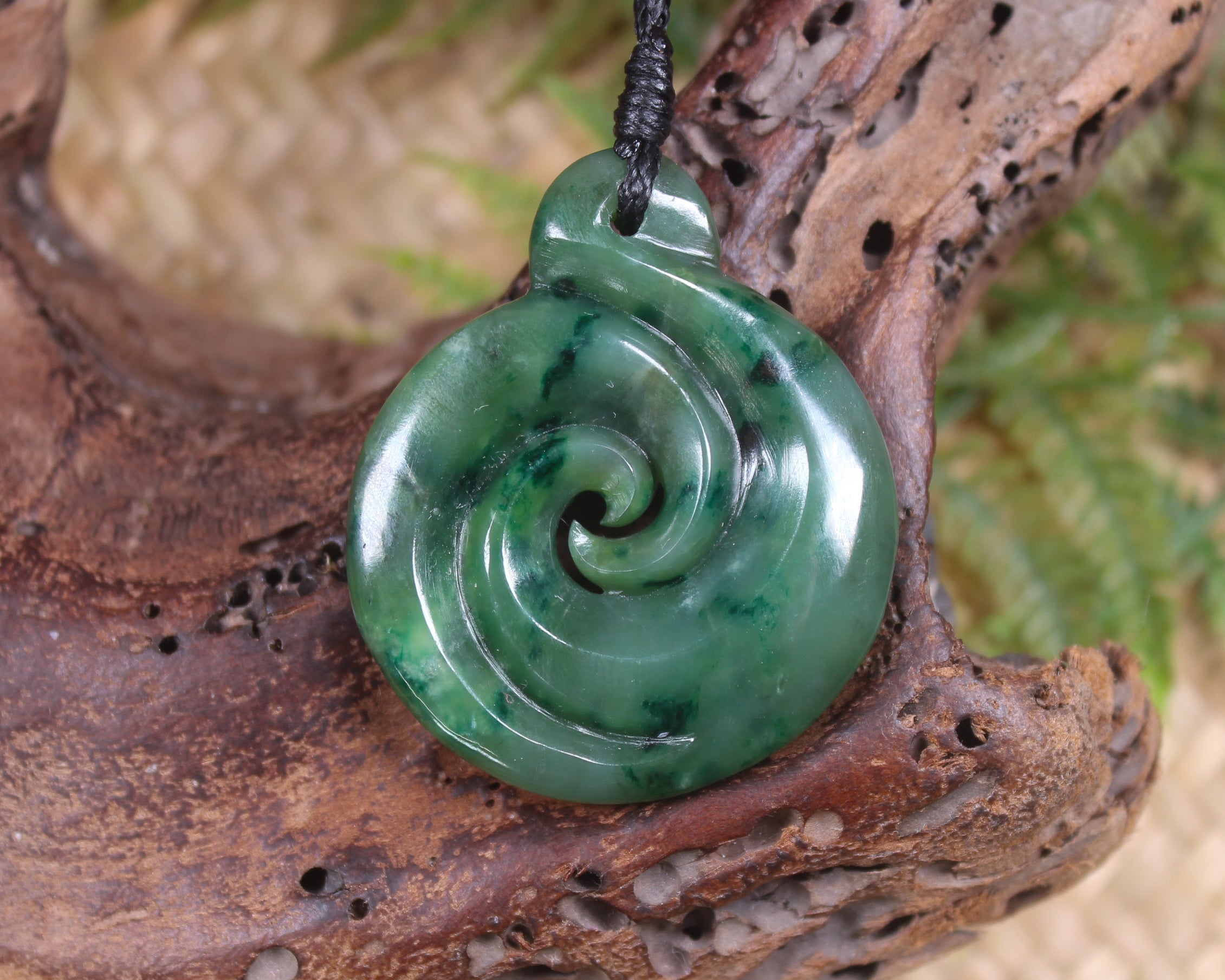 Koru pendant carved from Kawakawa Pounamu - NZ Greenstone