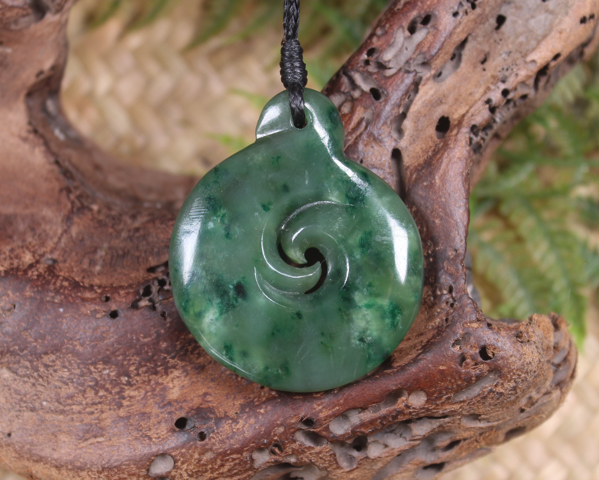 Koru pendant carved from Kawakawa Pounamu - NZ Greenstone