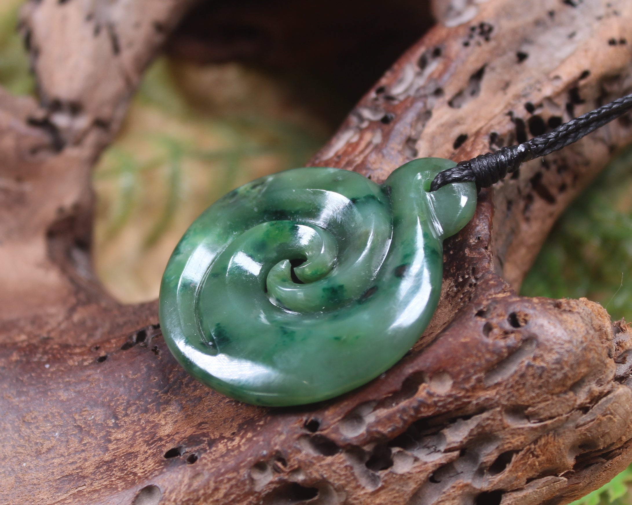 Koru pendant carved from Kawakawa Pounamu - NZ Greenstone