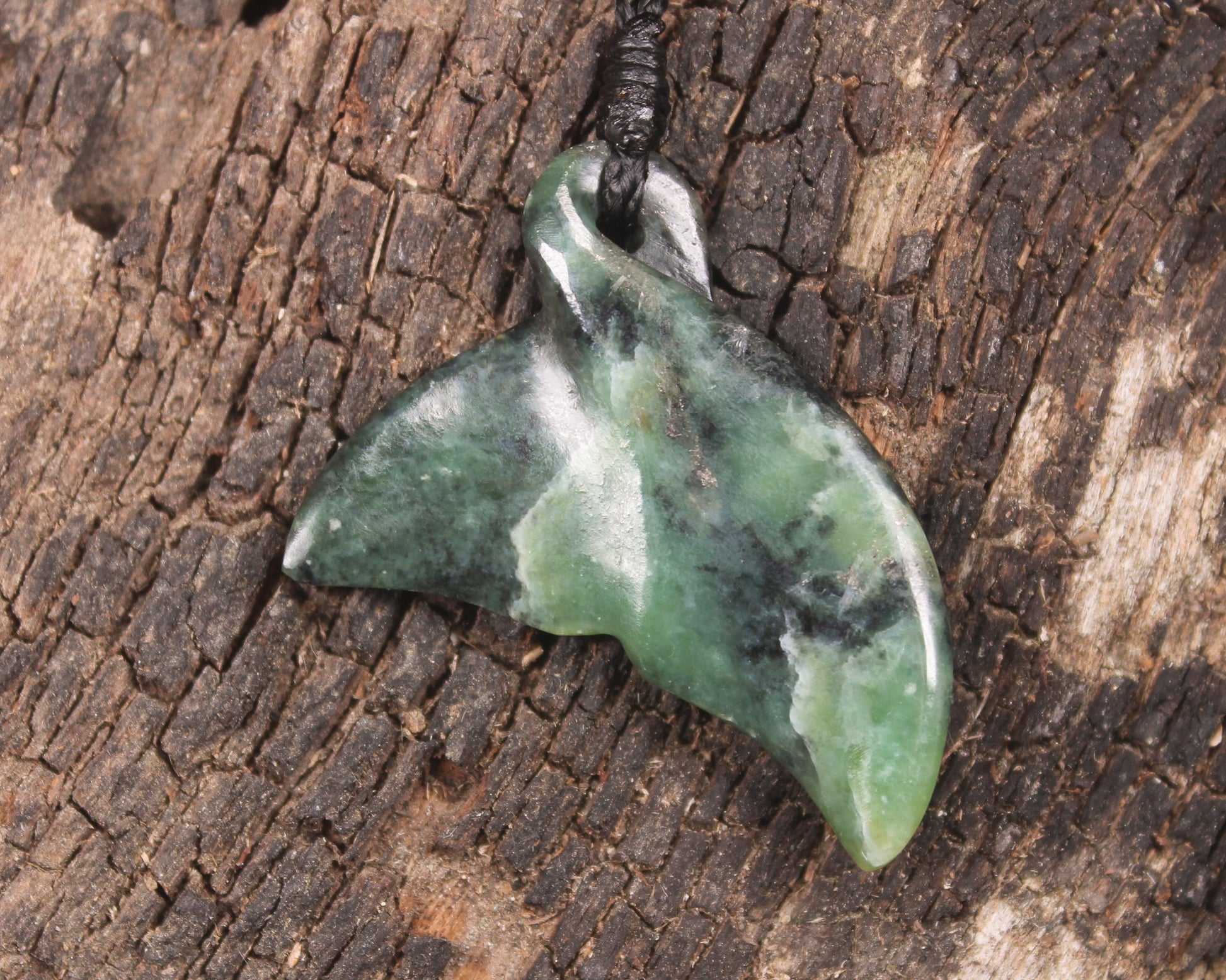 Whale tail carved from Inanga Pounamu - NZ Greenstone