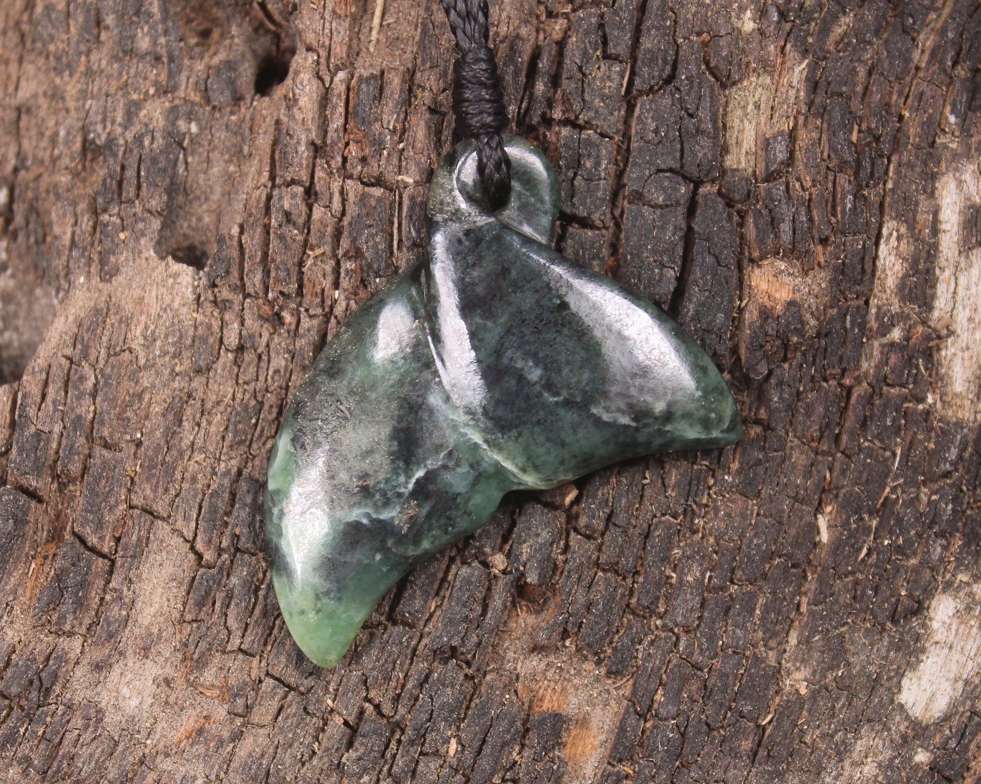 Whale tail carved from Inanga Pounamu - NZ Greenstone