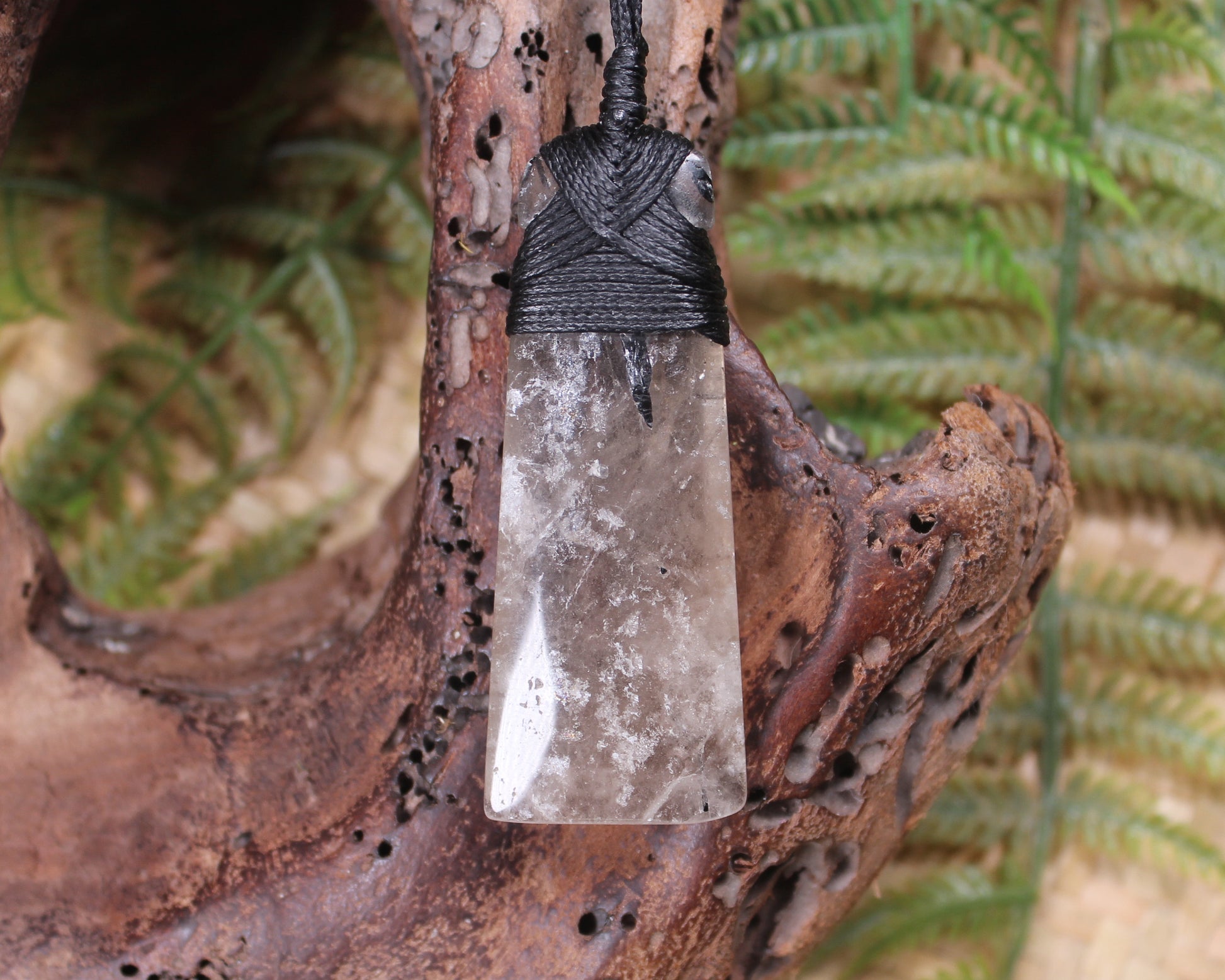 Smokey Quartz with Black Tourmaline carved into a Toki or Adze
