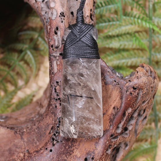 Smokey Quartz with Black Tourmaline carved into a Toki or Adze