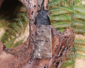 Smokey Quartz with Black Tourmaline carved into a Toki or Adze
