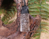 Smokey Quartz with Black Tourmaline carved into a Toki or Adze