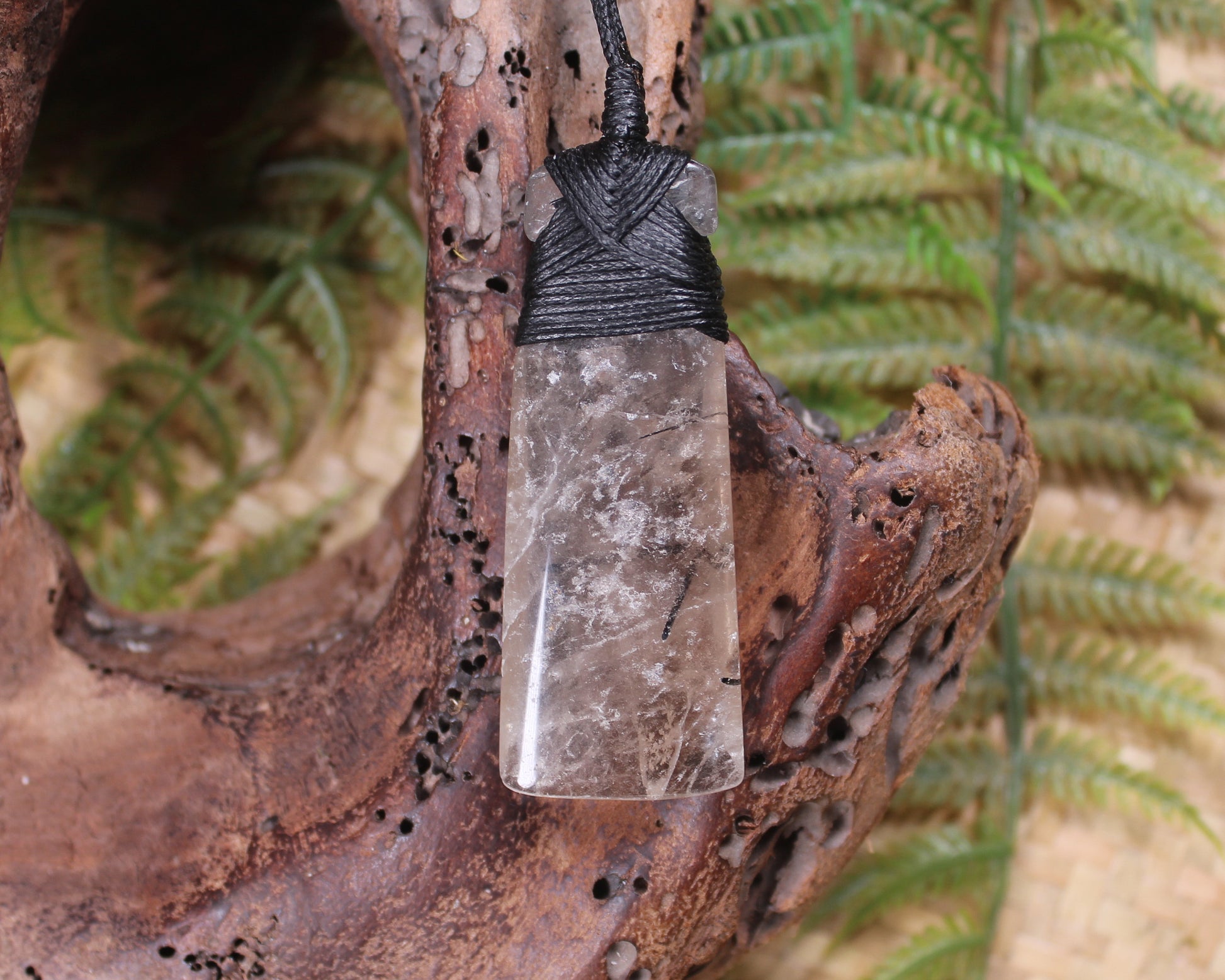 Smokey Quartz with Black Tourmaline carved into a Toki or Adze