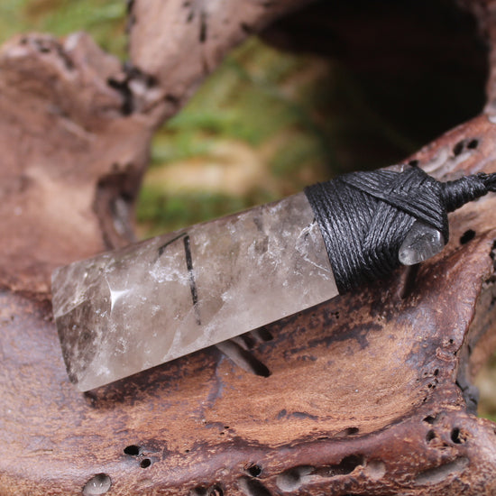 Smokey Quartz with Black Tourmaline carved into a Toki or Adze