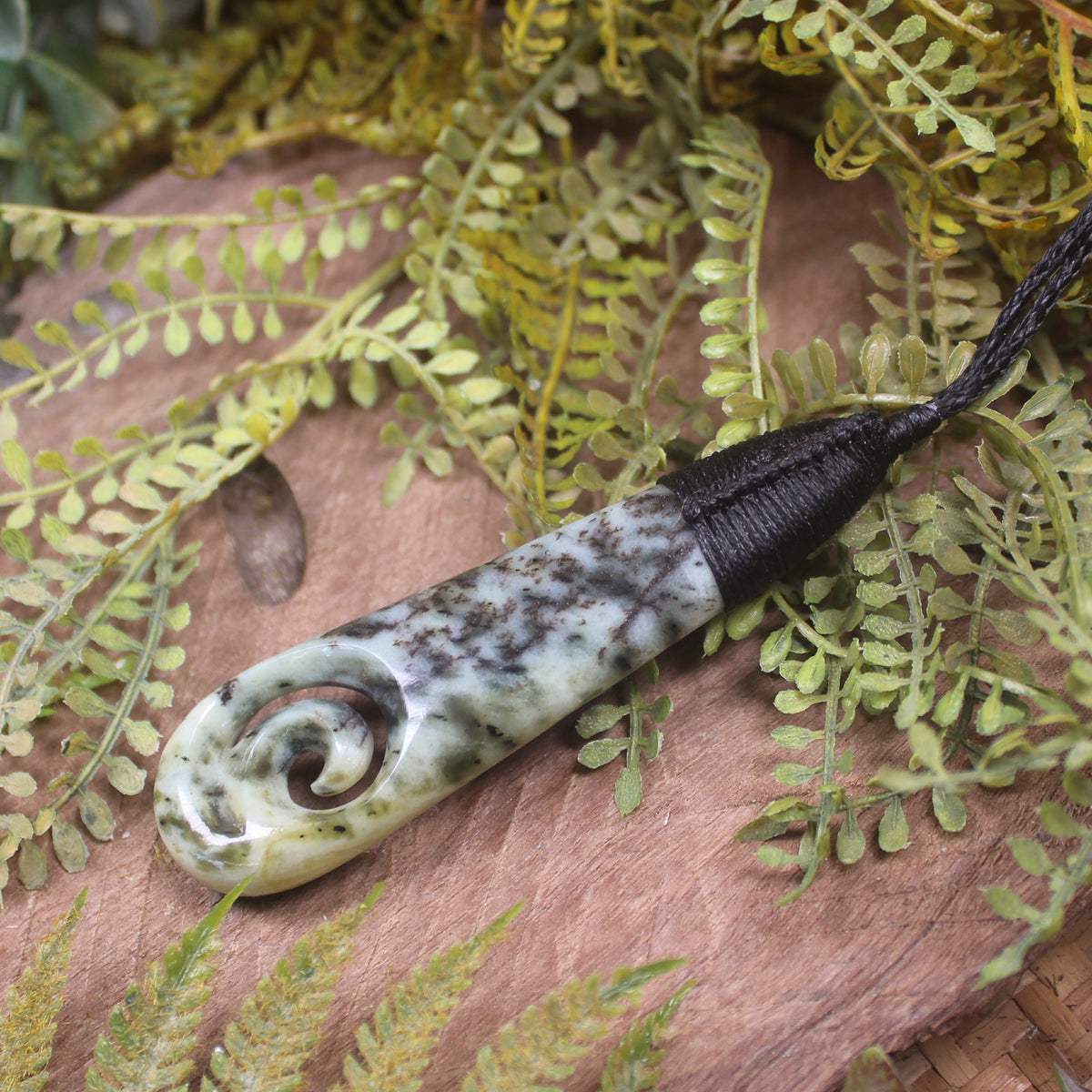 Roimata or Teardrop with Koru carved from Rimu Pounamu - NZ Greenstone