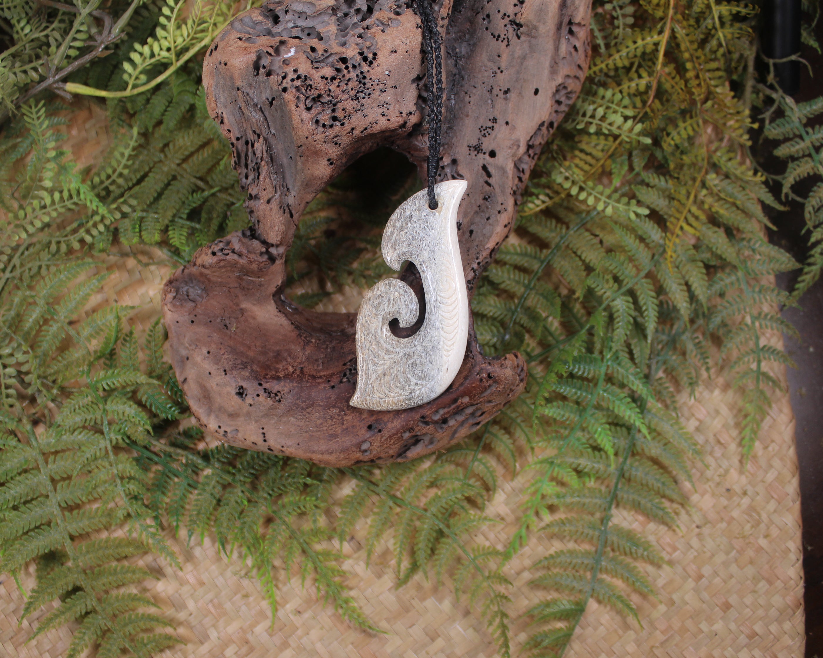 Hei Matau carved from Whale Bone
