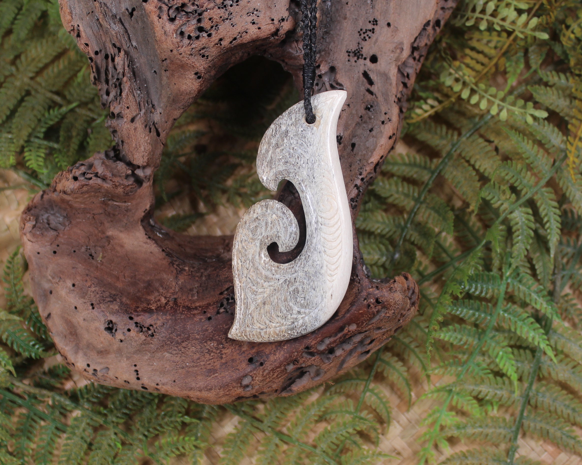 Hei Matau carved from Whale Bone