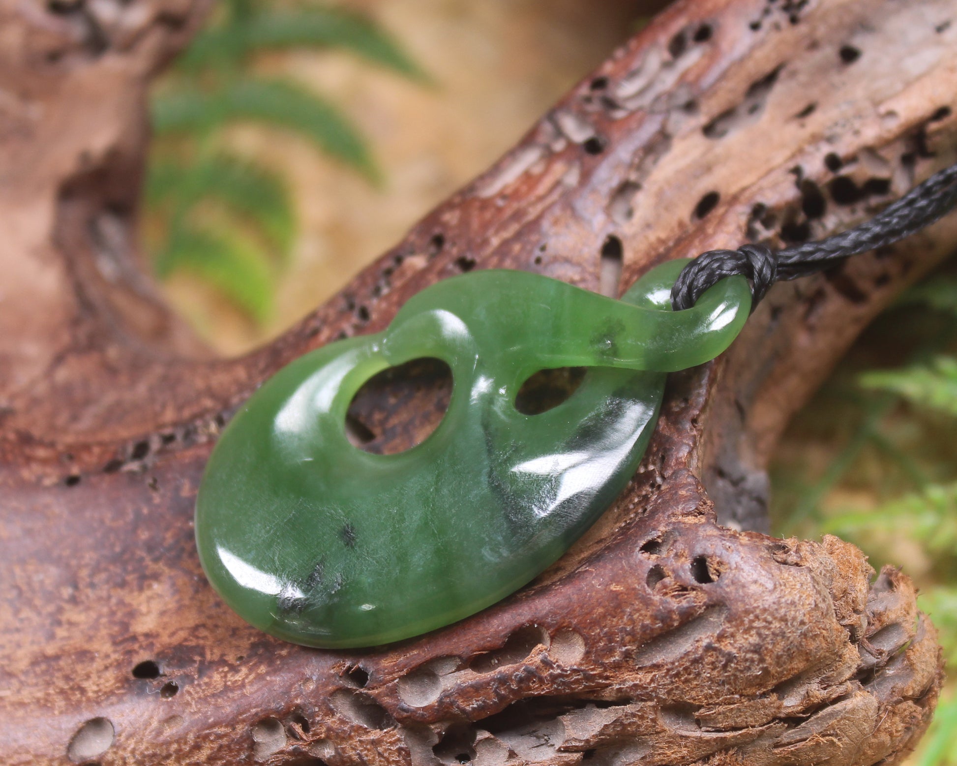 Koru Twist Pendant carved from Hapopo Pounamu - NZ Greenstone