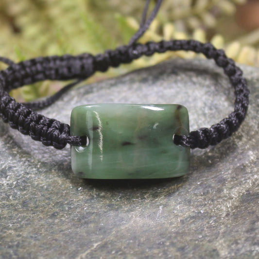 Adjustable cord bracelet with Hapopo Pounamu