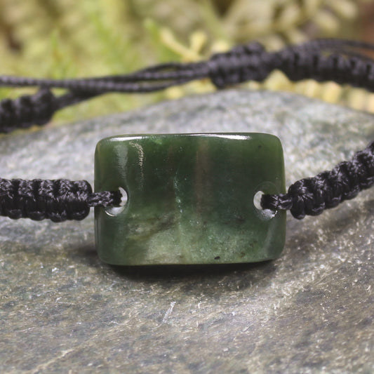 Adjustable cord bracelet with Kawakawa Pounamu
