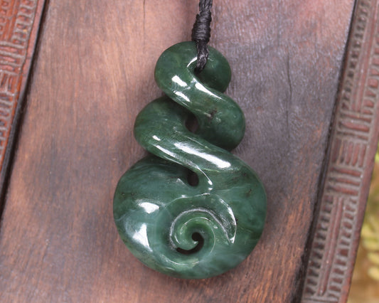 Koru Twist carved from Kawakawa Pounamu - NZ Greenstone