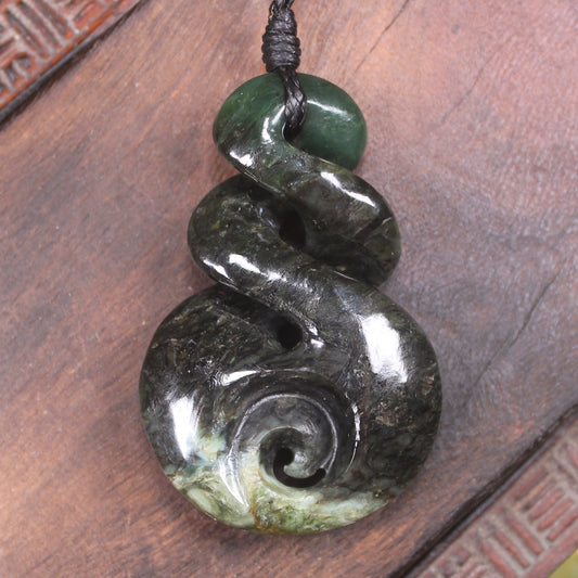 Koru Twist carved from Kawakawa Pounamu - NZ Greenstone
