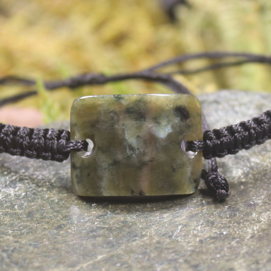 Adjustable cord bracelet with Rimu Pounamu