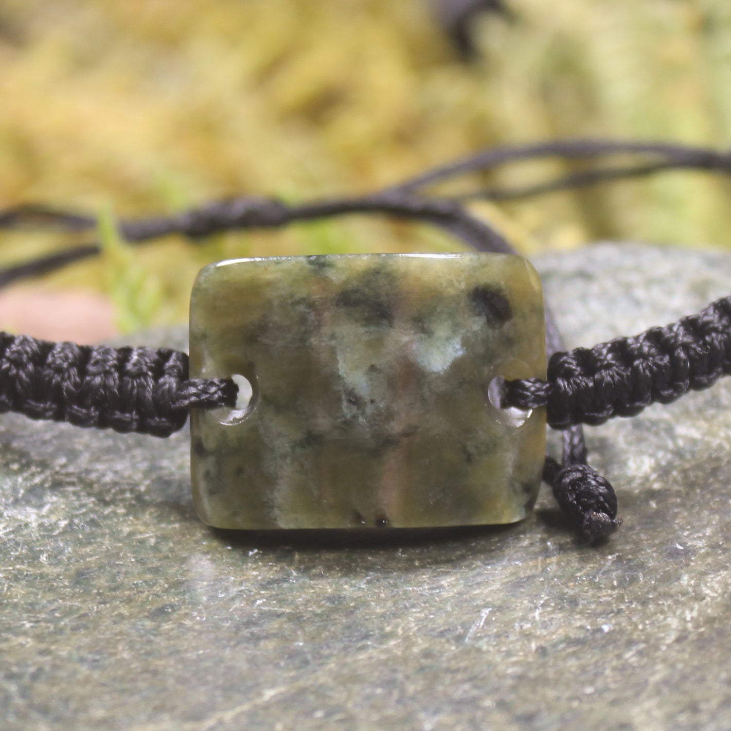 Adjustable cord bracelet with Rimu Pounamu