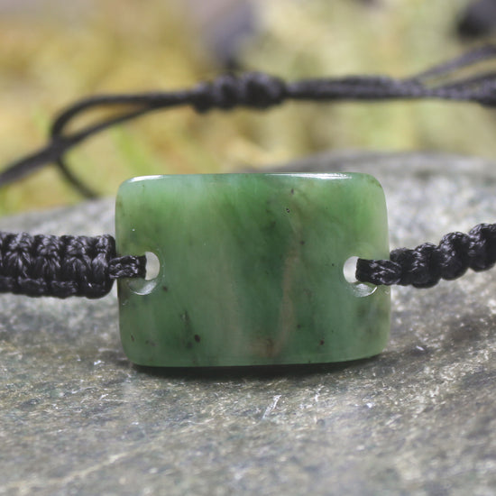 Adjustable cord bracelet with Hapopo Pounamu