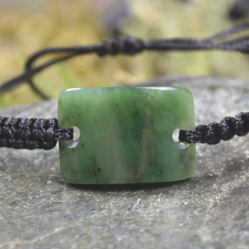 Adjustable cord bracelet with Hapopo Pounamu