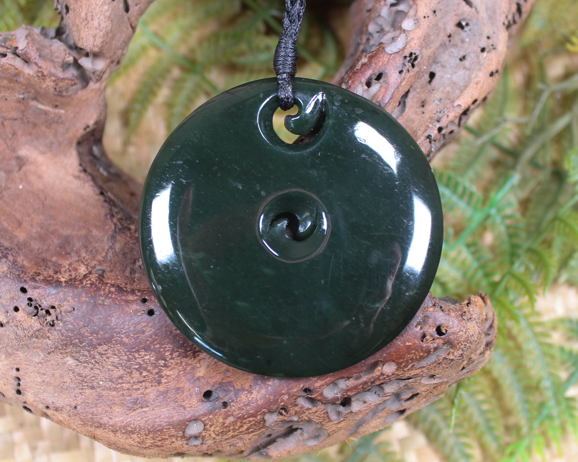 Koru pendant carved from Kawakawa Pounamu - NZ Greenstone