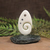 Bone Koru sculpture 