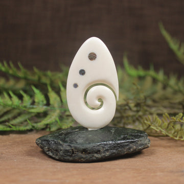 Bone Koru sculpture 