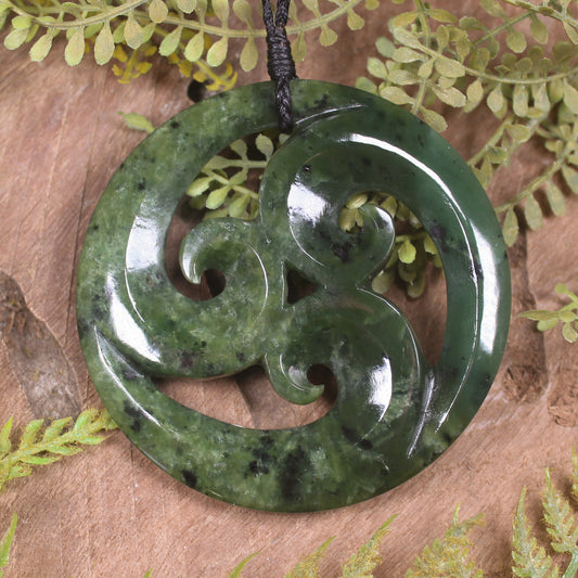 Koru pendant carved from Rimu Pounamu - NZ Greenstone