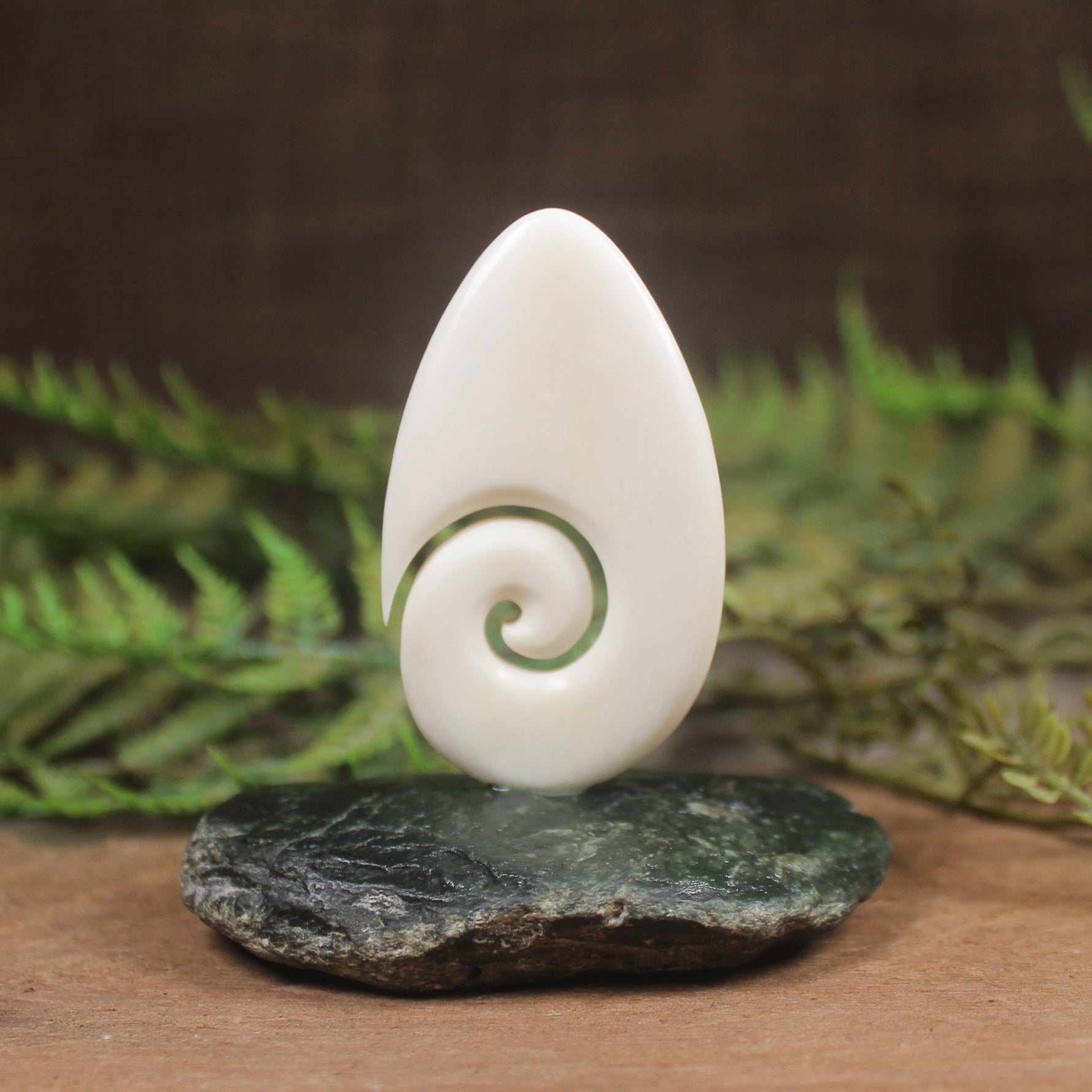 Bone Koru sculpture 