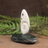 Bone Koru sculpture 