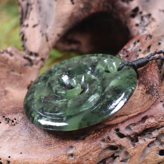 Koru carved from Rimu Pounamu - NZ Greenstone