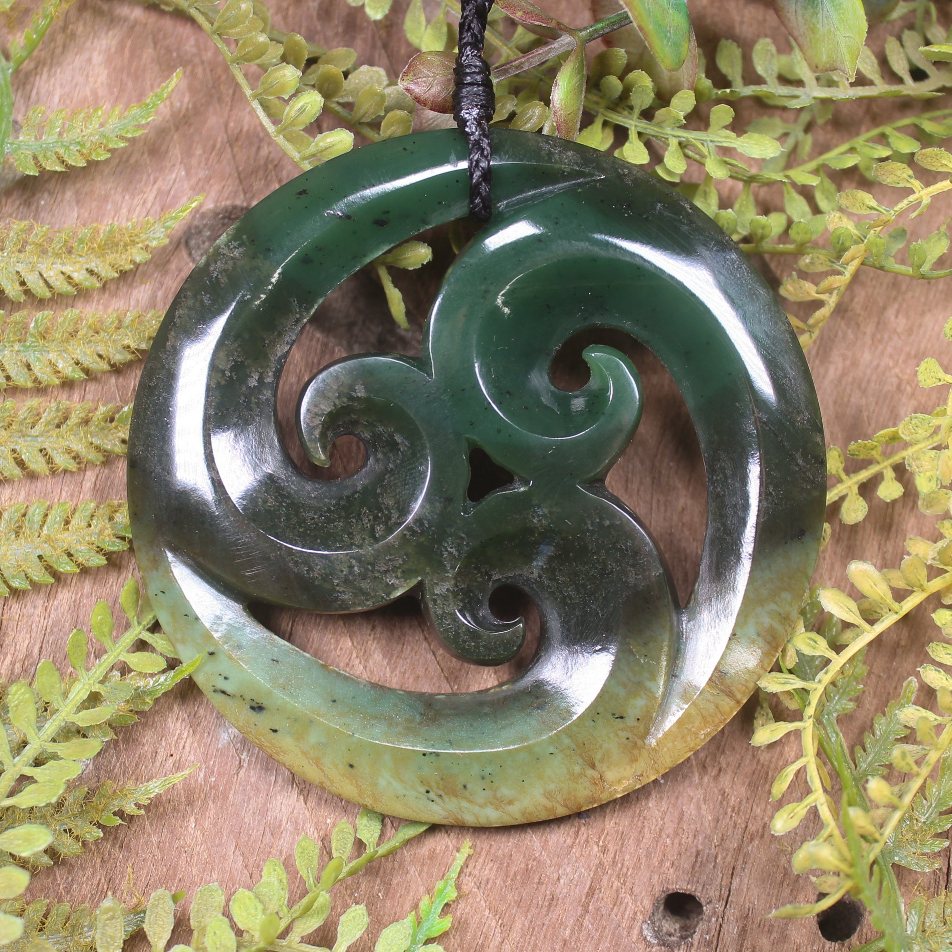 Koru pendant carved from Flower Jade Pounamu - NZ Greenstone