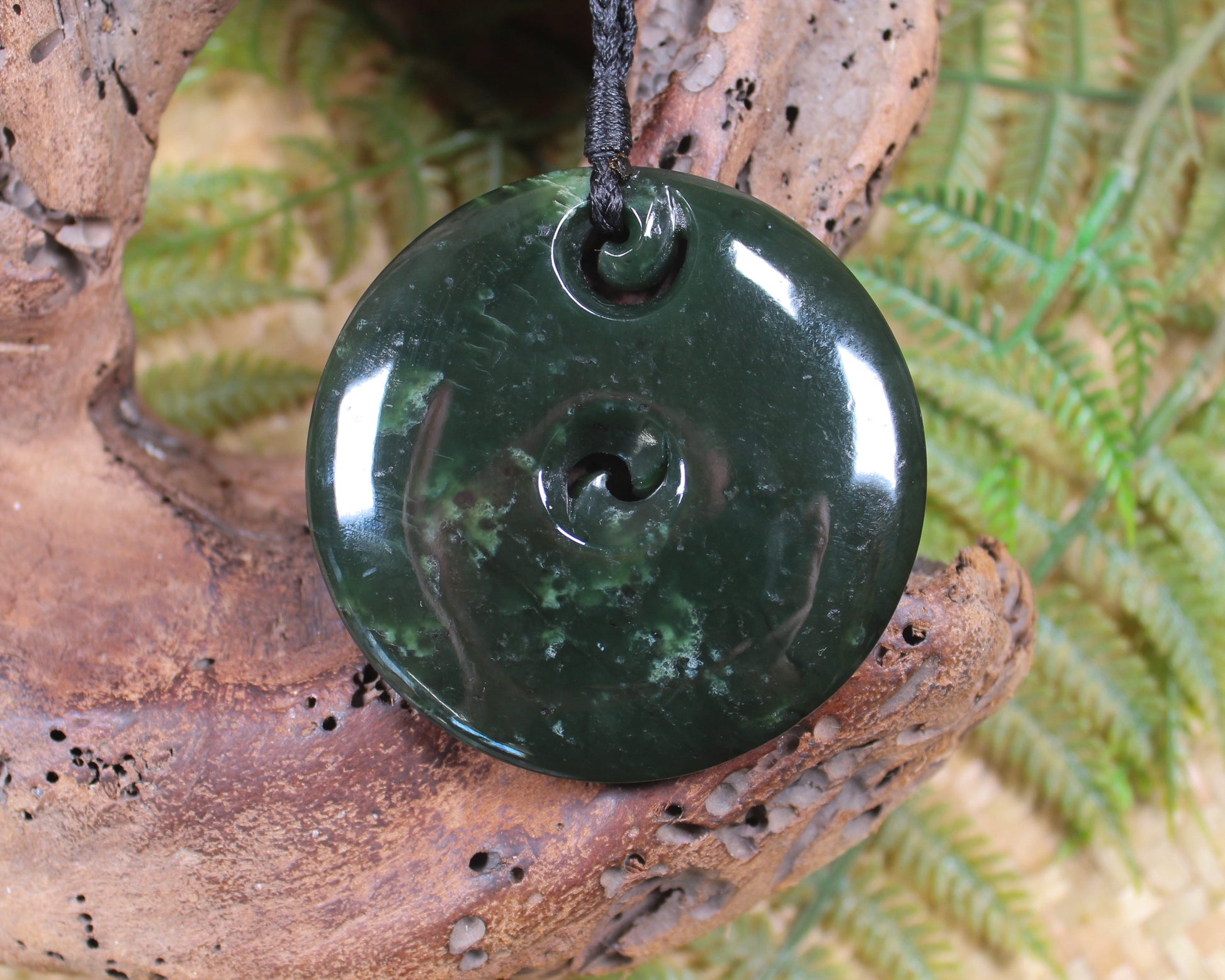 Koru carved from Rimu Pounamu - NZ Greenstone