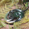 Koru pendant carved from Flower Jade Pounamu - NZ Greenstone