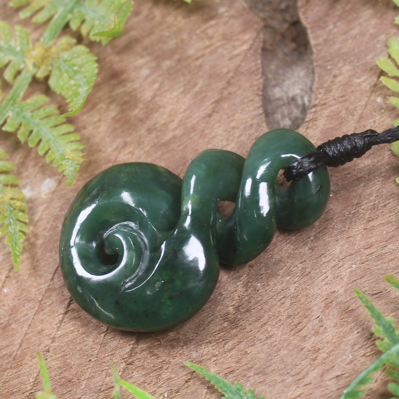 Koru Twist carved from Kawakawa Pounamu - NZ Greenstone