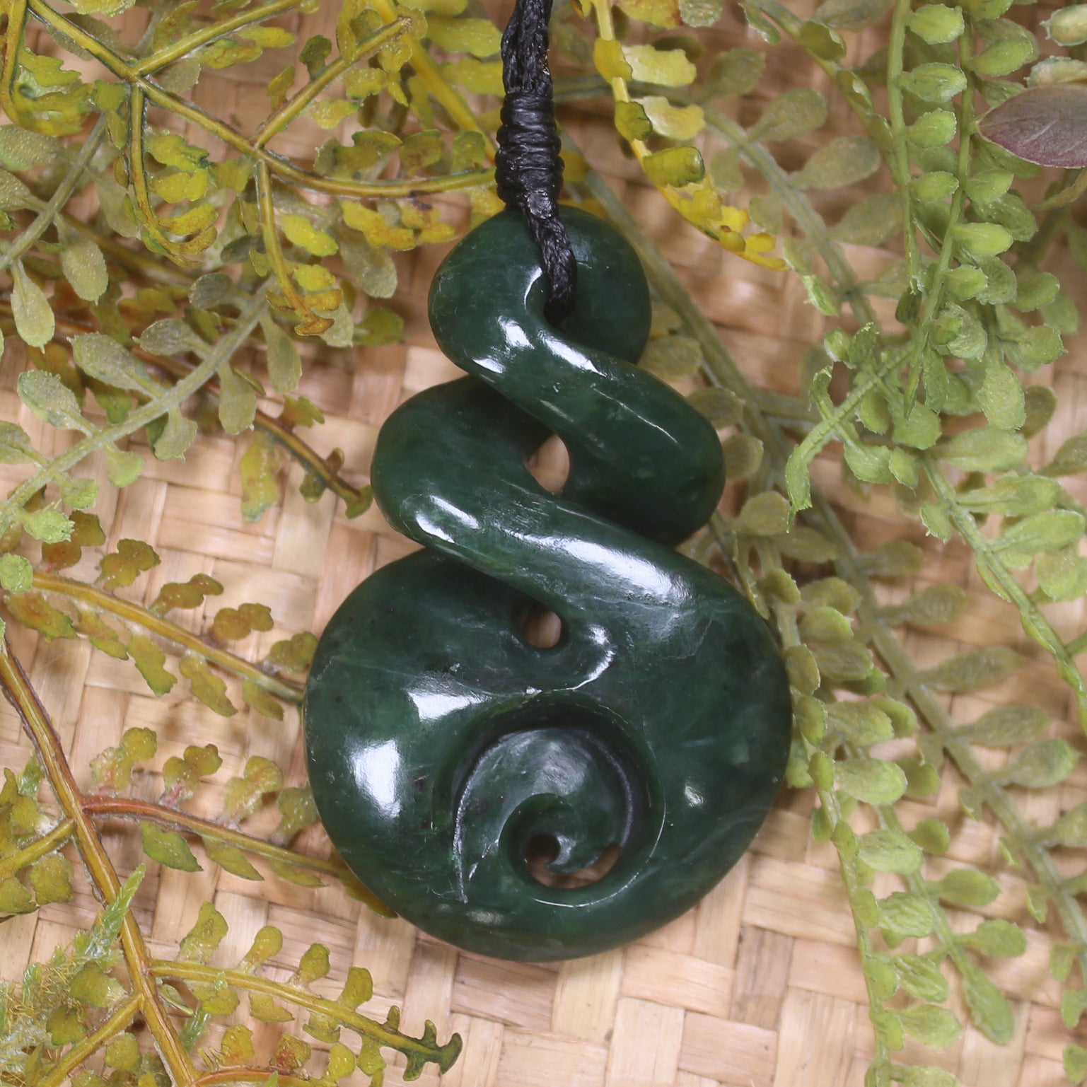 Koru Twist carved from Kawakawa Pounamu - NZ Greenstone