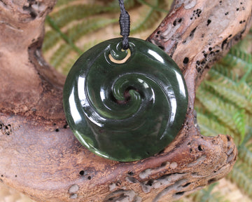 Koru carved from Rimu Pounamu - NZ Greenstone
