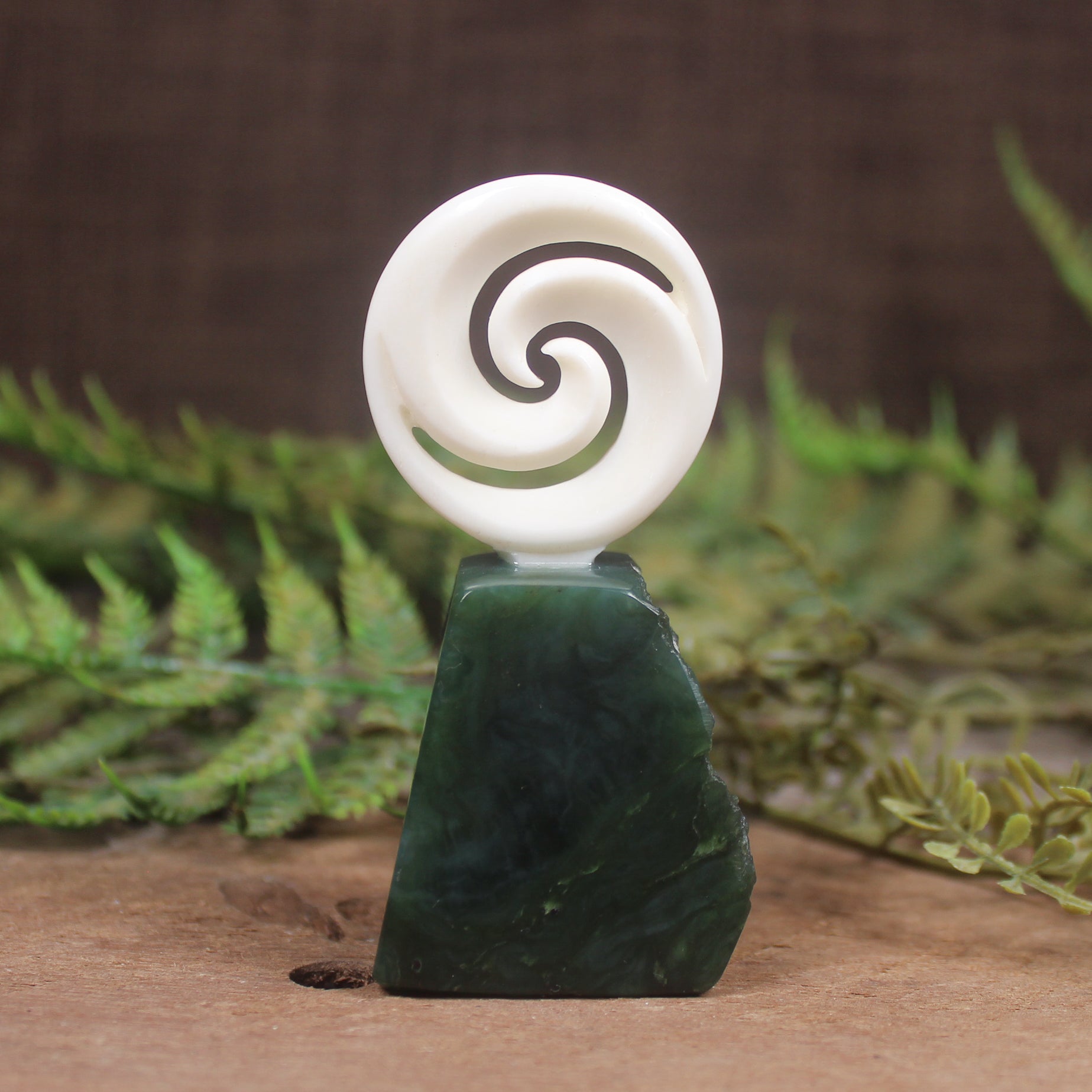bone koru sculpture