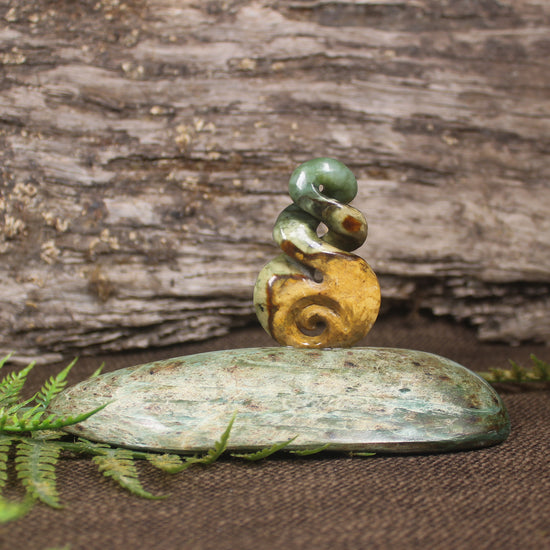 Flower Jade Pounamu Koru Twist set on a Pounamu base - NZ Greenstone