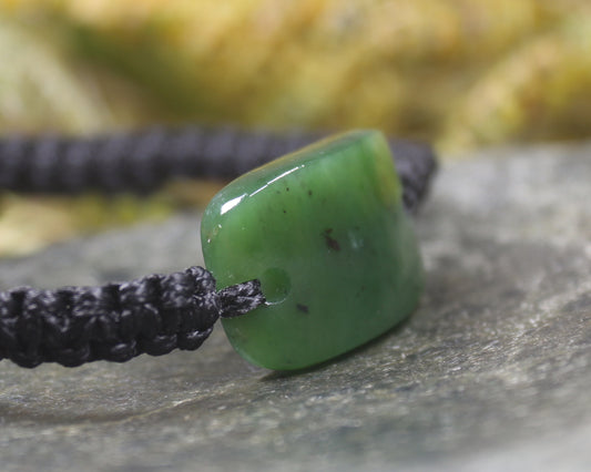 Adjustable cord bracelet with Hapopo Pounamu